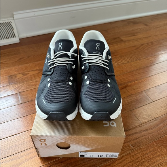 On Running Charcoal and White Athletic Shoes